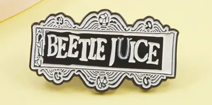 Beetle juice pin badge